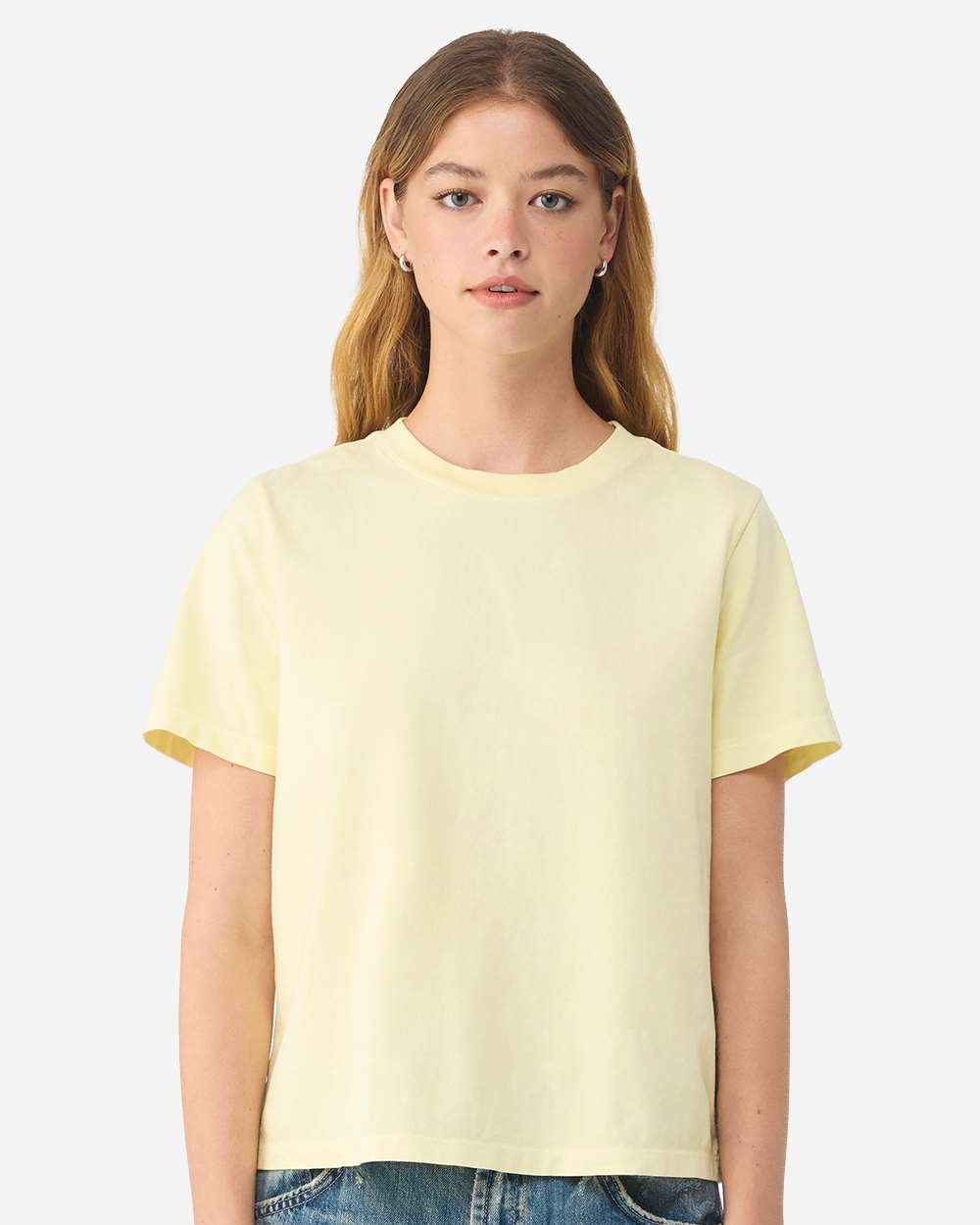 BELLA+CANVAS Women's Heavyweight Garment-Dyed Tee BC6110GD in Buttermilk, front view on model