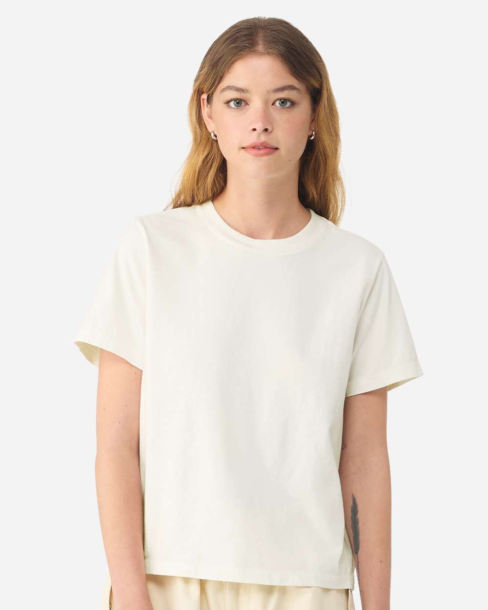 BELLA+CANVAS Women's Heavyweight Garment-Dyed Tee BC6110GD in Vintage White, front view on model