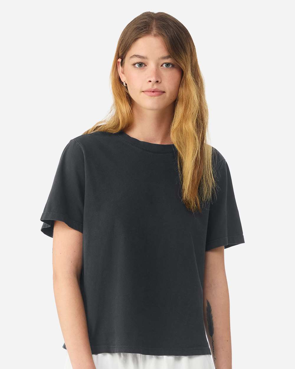 BELLA+CANVAS Women's Heavyweight Garment-Dyed Tee BC6110GD in Washed Black, front view on model